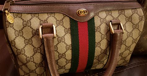 how to tell if your gucci slides are real|identify vintage Gucci bags.